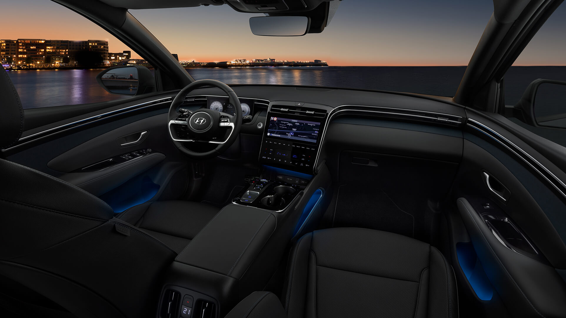 Fotografie interiéru zcela nového modelu Hyundai Tucson s přizpůsobitelným ambientním LED osvětlením.